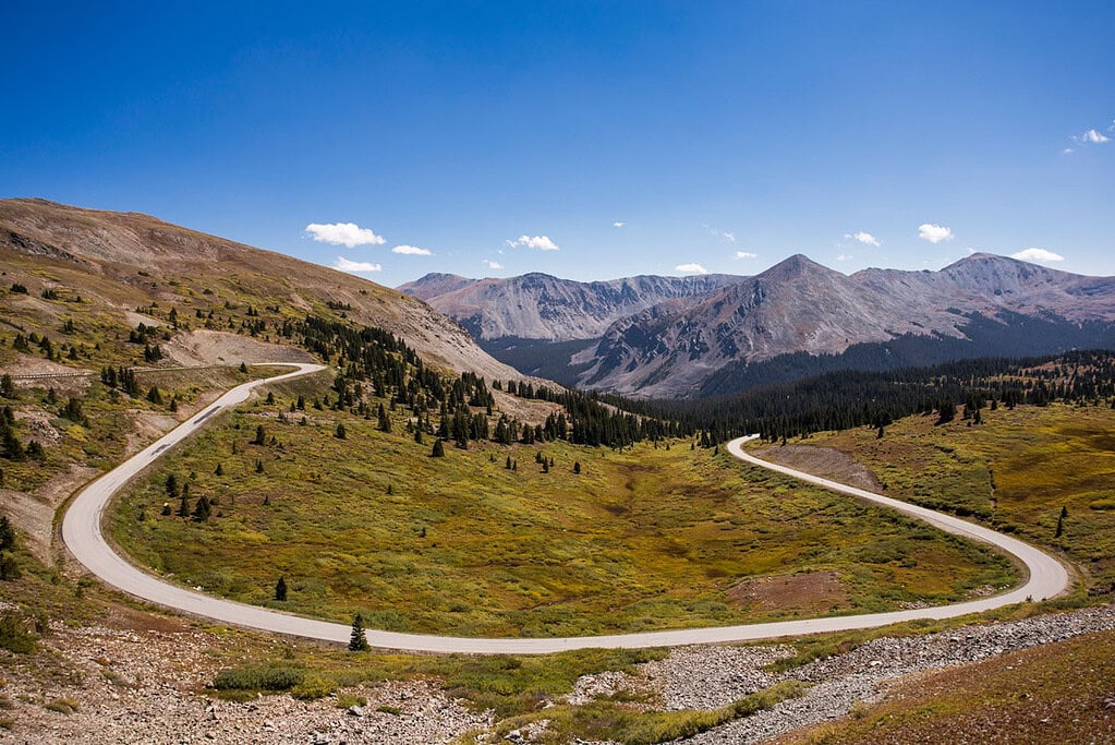 overlooking the horse shoe shaped highway that climbs over Cottonwood Pass with sprawling views of the Rocky Mountains
