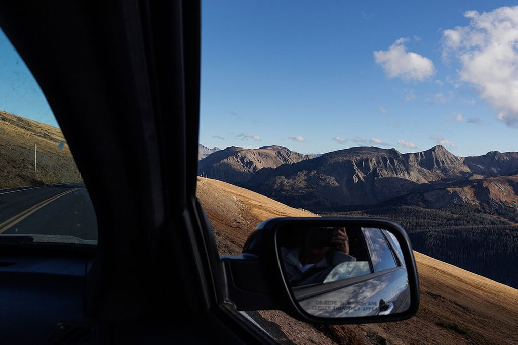 view of the Rocky Mountains out a car window