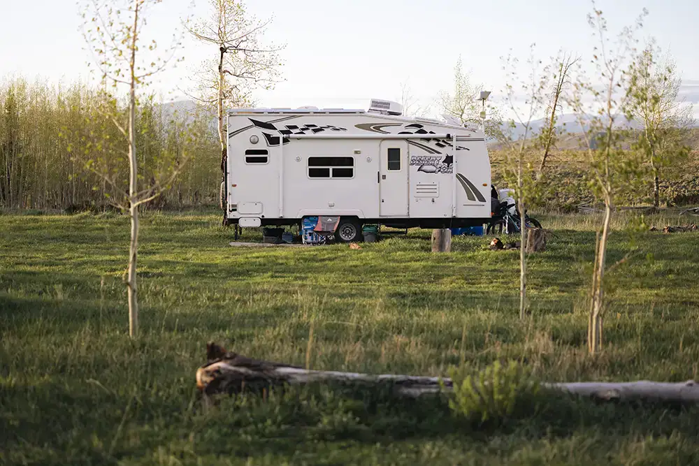 White Desert Fox camper trailer parked for boondocking off-grid overlanding adventure.